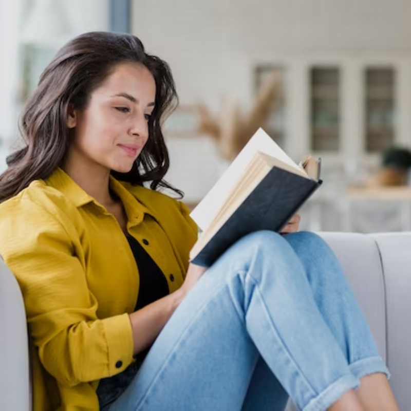mulher sentada lendo